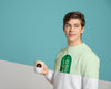 Front View Of Man In Sweater Holding Mug Psd
