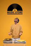 Front View Of Man Looking For Music Store Mock-Up Psd