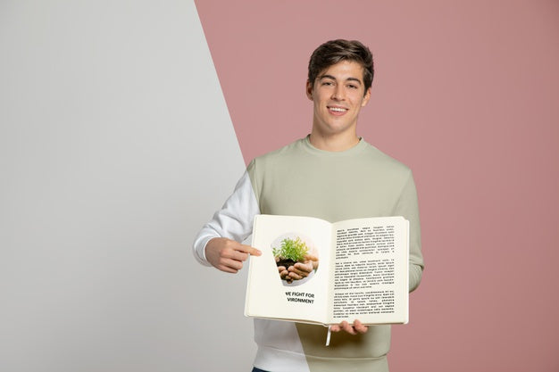 Front View Of Man Pointing At Book He'S Holding Psd