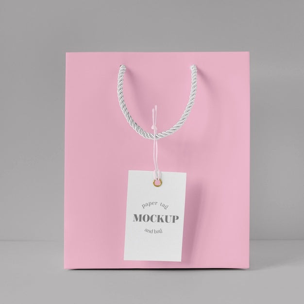 Front View Of Paper Shopping Bag Mock-Up With Paper Tag Psd