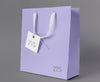 Front View Of Paper Shopping Bag Mock-Up With Paper Tag Psd