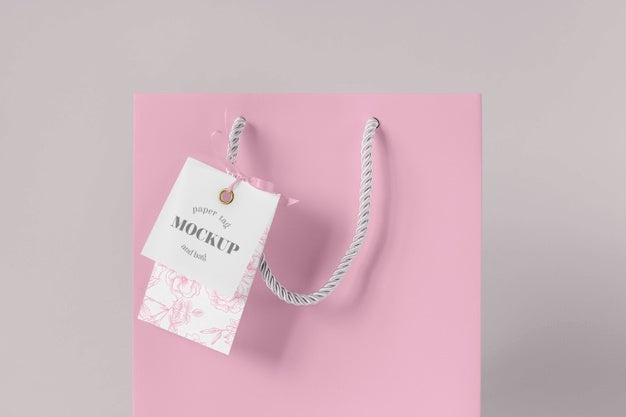 Front View Of Paper Shopping Bag Mock-Up With Paper Tag Psd