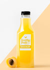 Front View Of Peach Juice Bottle With Cap Psd