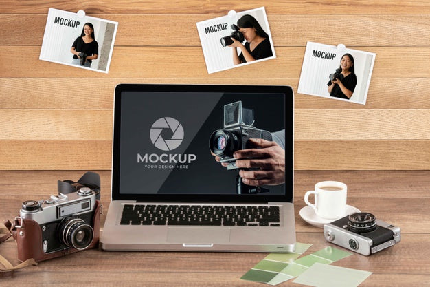 Front View Of Photographer Wooden Workspace With Laptop Psd