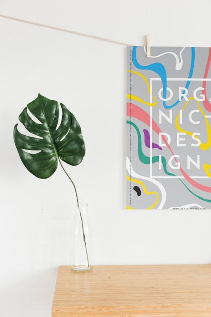 Front View Of Poster With Leaf In Vase Psd