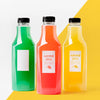 Front View Of Selection Of Clear Juice Bottles Psd