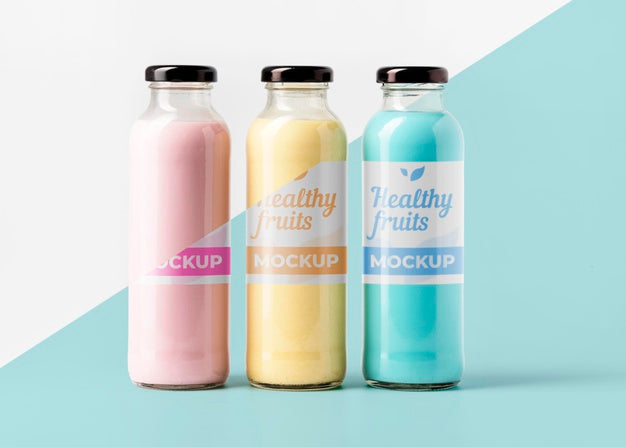 Front View Of Selection Of Clear Juice Bottles Psd