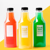 Front View Of Selection Of Juice Bottles Psd