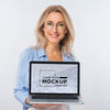 Front View Of Smiley Woman With Glasses Holding Laptop Psd