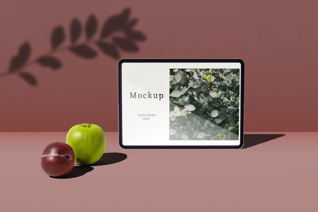 Front View Of Tablet With Apple And Plum Psd