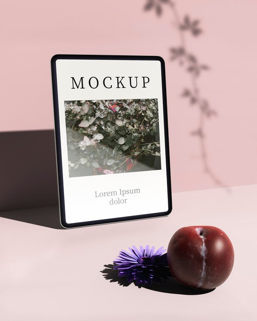 Front View Of Tablet With Plum And Flower Psd