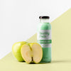 Front View Of Transparent Juice Bottle With Apples Psd