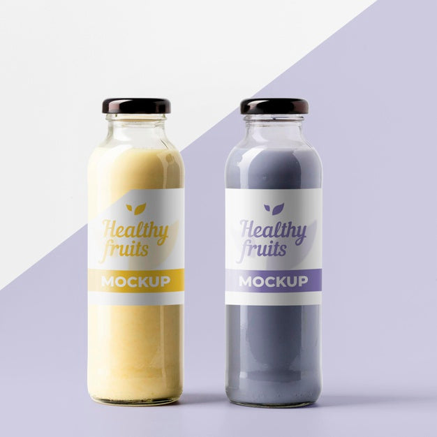Front View Of Transparent Juice Bottles Psd