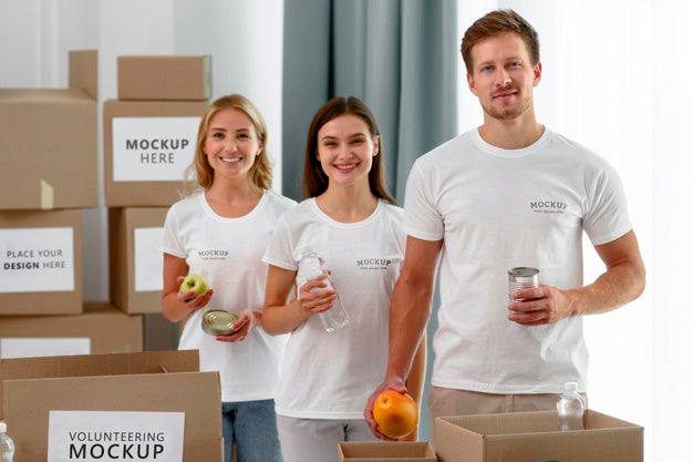 Front View Of Volunteers Holding Provisions For Donation Psd