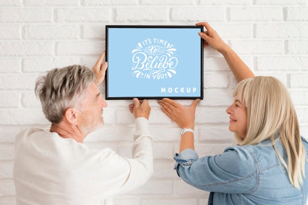 Front View Of Woman Holding A Frame Mock-Up Psd