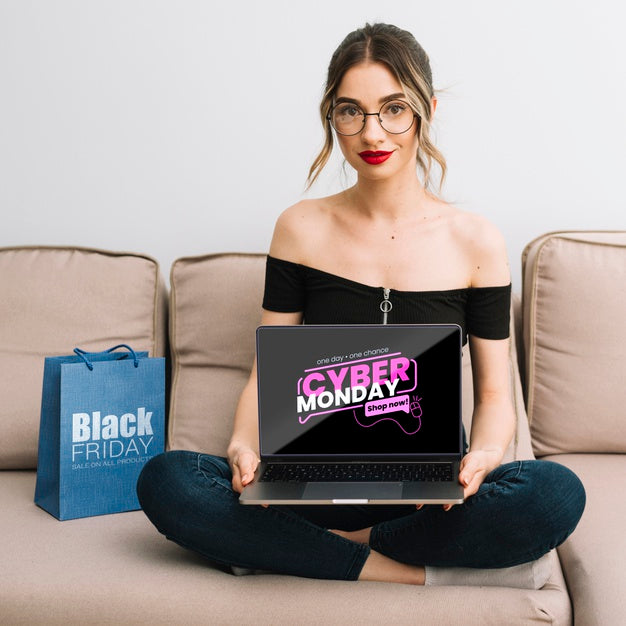 Front View Of Woman Holding A Laptop With Cyber Monday Offer Psd