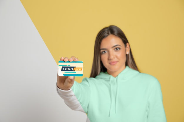 Front View Of Woman Holding Business Card Psd