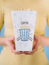 Front View Of Woman Holding Popcorn Cup Psd