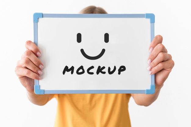 Front View Of Woman Holding Whiteboard In Her Hands Psd