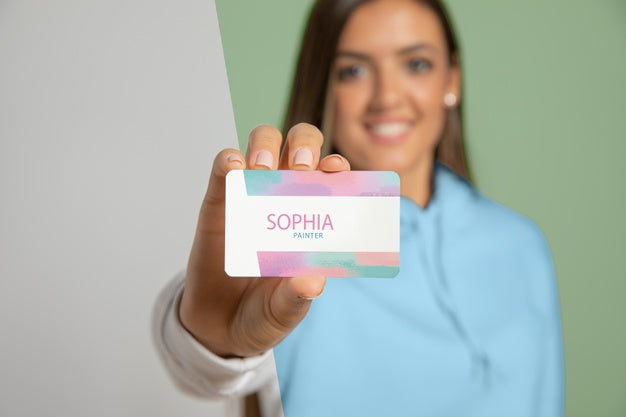 Front View Of Woman Showing Business Card Psd