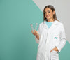 Front View Of Woman Wearing Lab Coat And Holding Test Tubes Psd