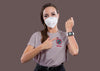 Front View Of Woman With Mask Pointing At Smartwatch Psd