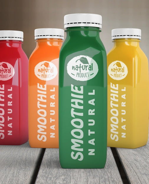 Front View Plastic Bottles With Different Fruit Or Vegetable Juices Psd