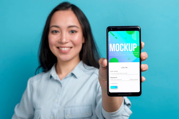 Front View Smiley Girl Holding Smartphone Psd