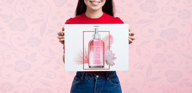 Front View Woman Holding A Mock-Up Ad For Cosmetics Psd