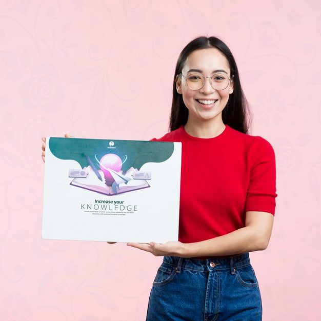 Front View Woman Holding A Mock-Up Ad For Courses Psd