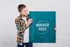 Front View Young Kid Holding Mock-Up Sign Psd