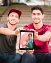 Front View Young Men With Tablet Outdoors Psd