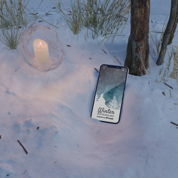 Frozen Scene With Phone And Candle Psd
