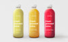 Fully Editable Mockup With Glass Bottles Of Different Flavours Psd