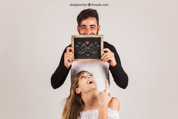 Funny Couple Showing Slate Psd