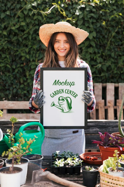 Gardener Holding Mock-Up Sign Psd