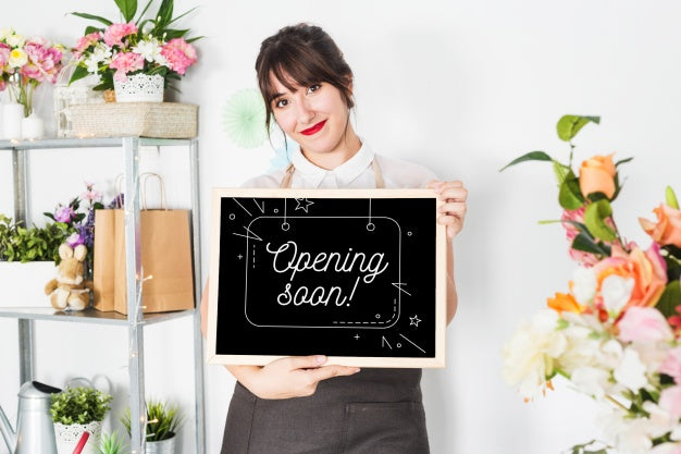 Gardening Concept With Woman Holding Slate Mockup Psd