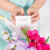 Gardening Concept With Woman Presenting Business Card Psd