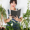 Gardening Concept With Woman Reading Book Psd