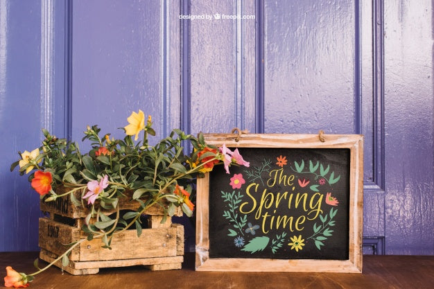 Gardening Mockup With Plants And Leaning Slate Psd