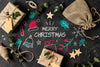 Gifts On Drawn Table With Christmas Theme Psd