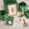 Gifts Wrapped In Green Paper On Table Psd