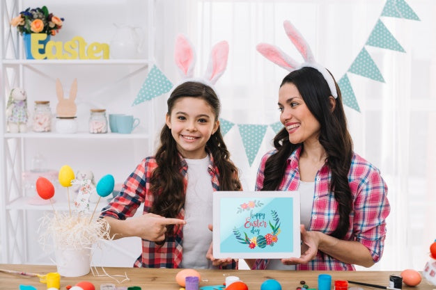 Girl And Mother With Tablet Mockup On Easter Day Psd