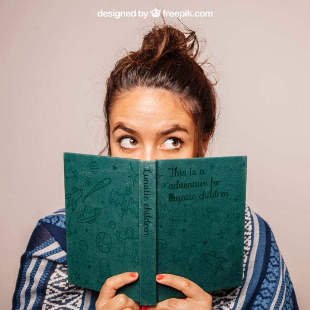 Girl Hiding Face Behind Book Psd
