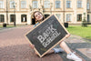 Girl Holding Back To School Blackboard Mock-Up Psd