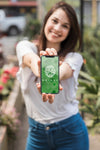Girl Holding Smartphone Mockup With Gardening Concept Psd
