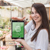 Girl Holding Tablet Mockup With Gardening Concept Psd