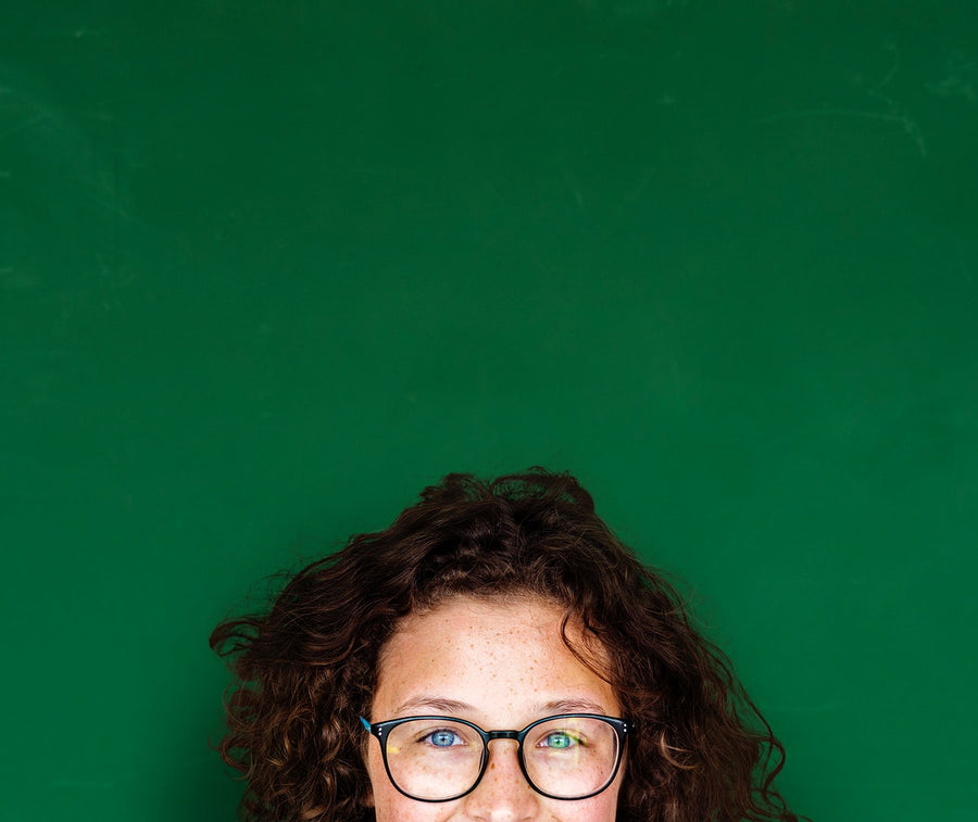 Girl With Curly Hair And Glasses