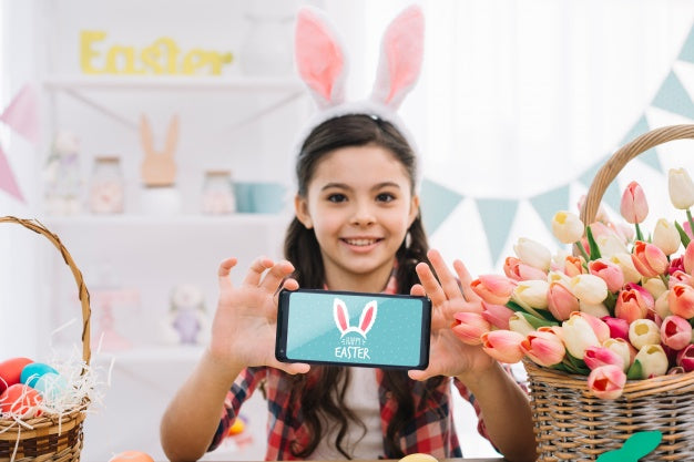 Girl With Smartphone Mockup On Easter Day Psd