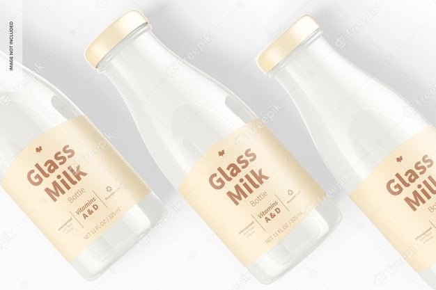 https://mockuphunt.co/cdn/shop/products/glass-milk-bottles-mockup-close-up-psd_60ed2e0fcf494_900x.jpg?v=1654252384